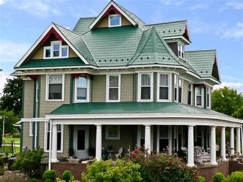 single story house colors with green metal roof|house with green roof.